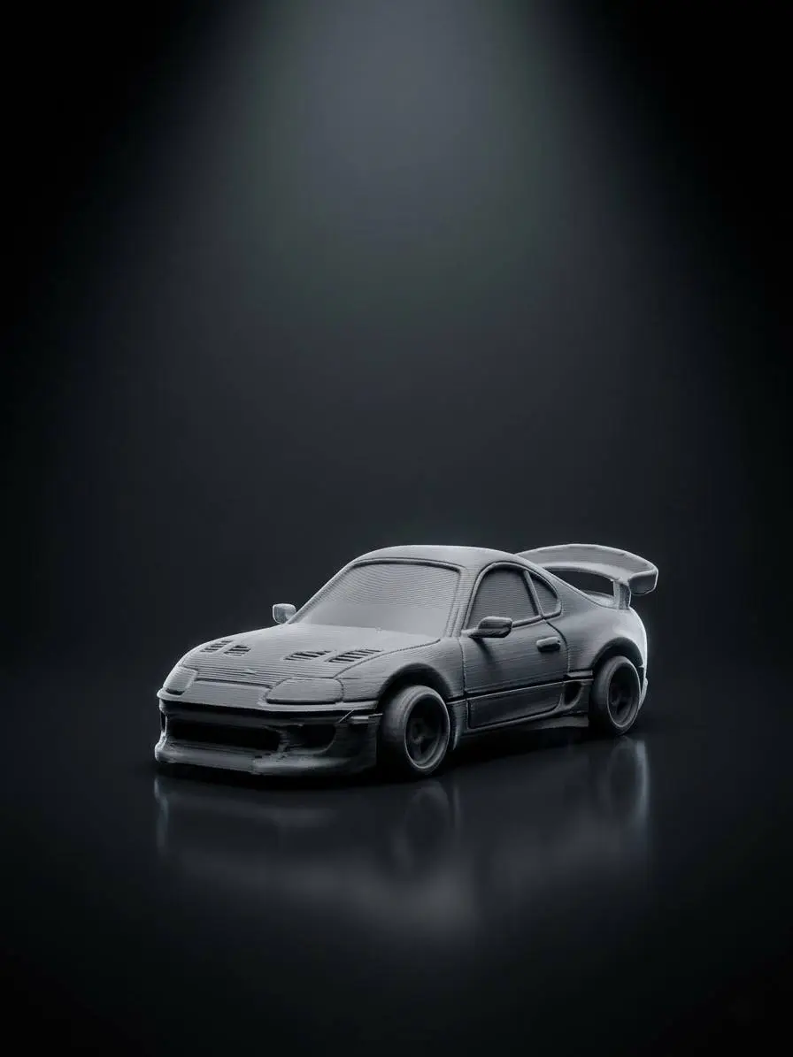 Grey sports car miniature from HAS+A Design Lab